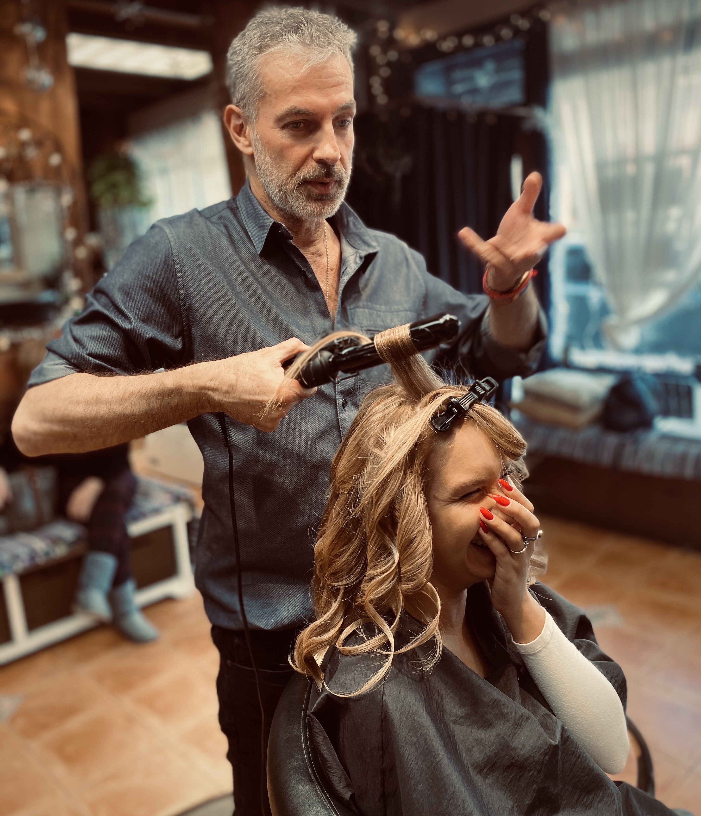 Curling iron, client laughing